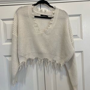 White distressed sweater